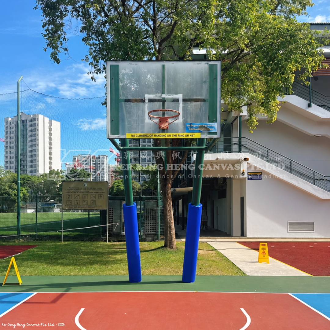 blue safety padding for basketball pole. KSH Canvas
